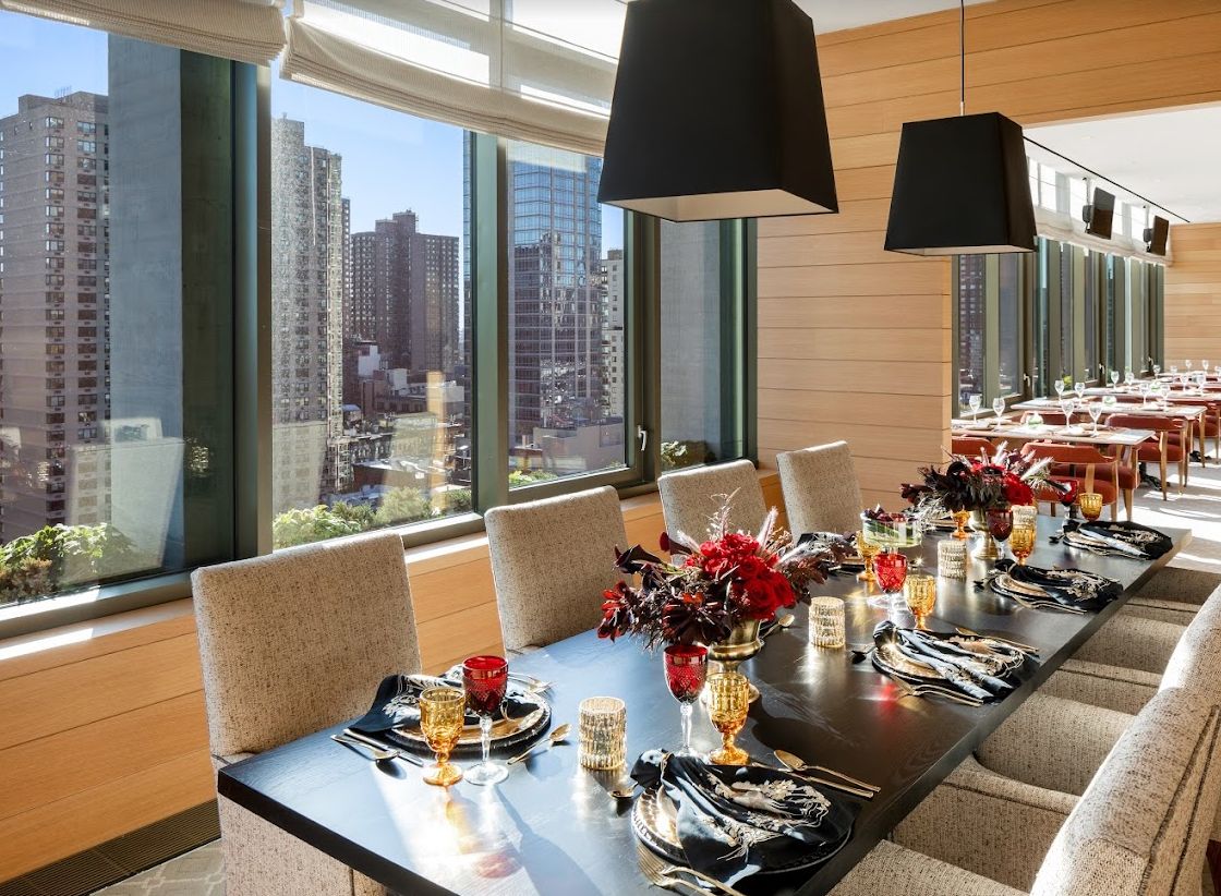 Elegant dining room at Inspir Carnegie Hill senior living community with tasteful decor.