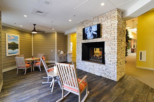 Interior view of Memory Care of Little Rock at Good Shepherd featuring cozy living and dining areas.