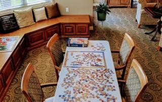 Senior living community at Courtyard Estates of Knoxville featuring dining room decor and architecture.