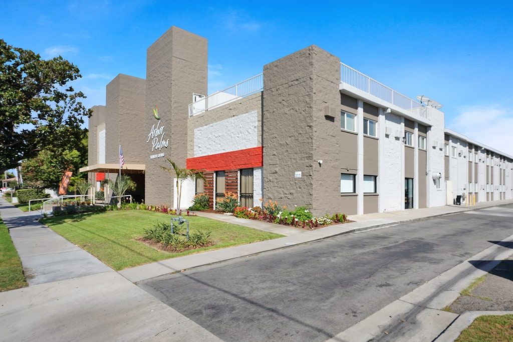 Senior living community Arbor Palms of Anaheim, showcasing suburban architecture and housing.