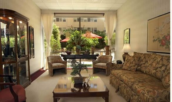 Interior view of Magnolia Of Millbrae senior living community featuring modern decor and furniture.