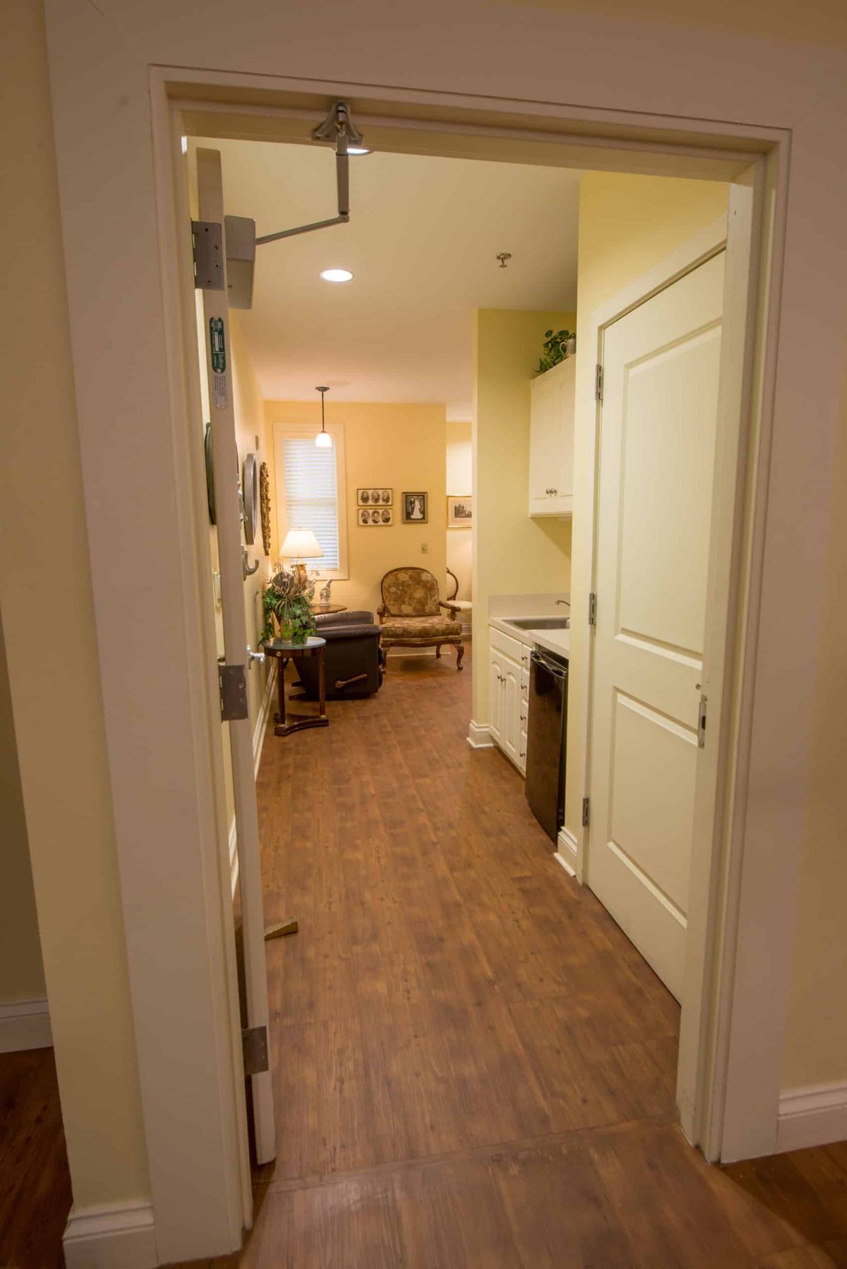 Interior view of hardwood flooring and architecture in a cottage at The Glen senior living community.