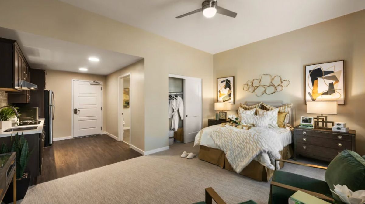 Interior design of a bedroom in Acoya South Bay senior living community with modern decor.