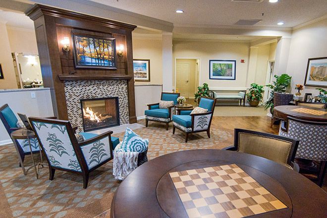 Our warm & welcoming Living Room in our Assisted Living is right outside of our Dining Room. Many residents like to enjoy coffee, conversation & television with each other in this space.