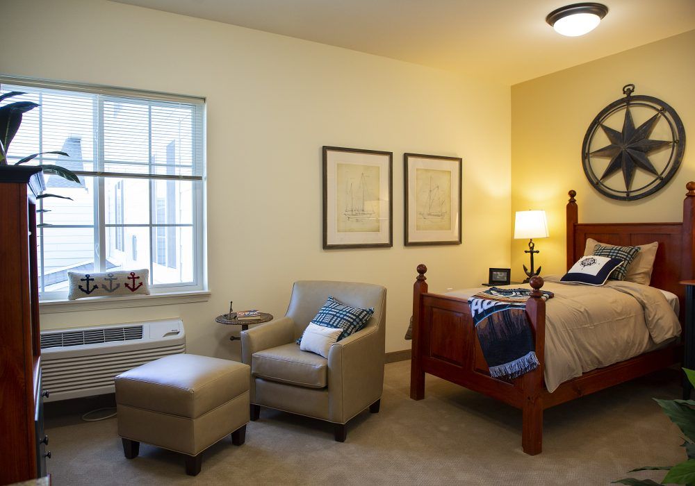 Senior living community bedroom at The Landing of Washington Square with stylish decor.