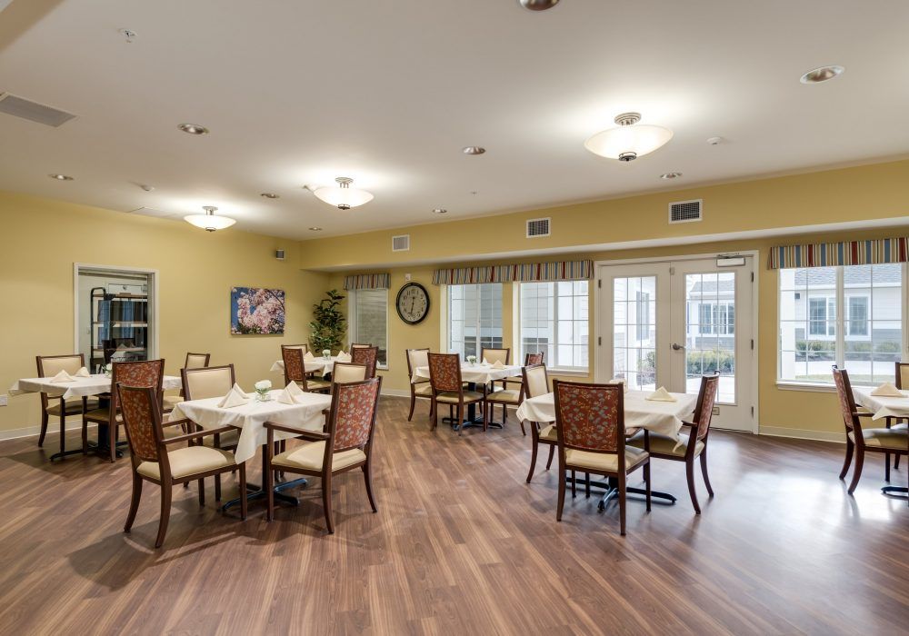 Interior view of The Landing of Silver Spring senior living community featuring dining room design.