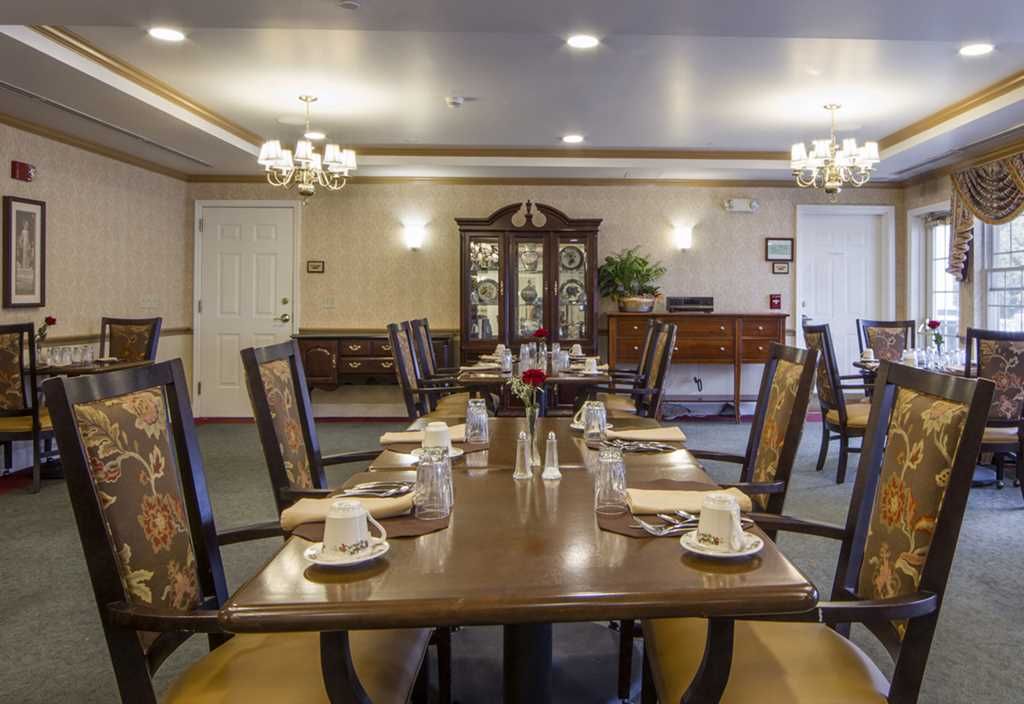 Interior view of Fairmont Senior Living in Farmington Hills featuring dining room and reception area.