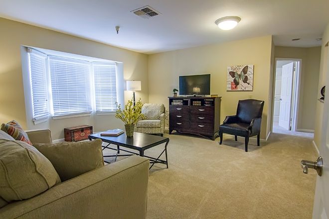 Interior view of Brookdale Westlake Hills senior living community featuring cozy furniture and decor.