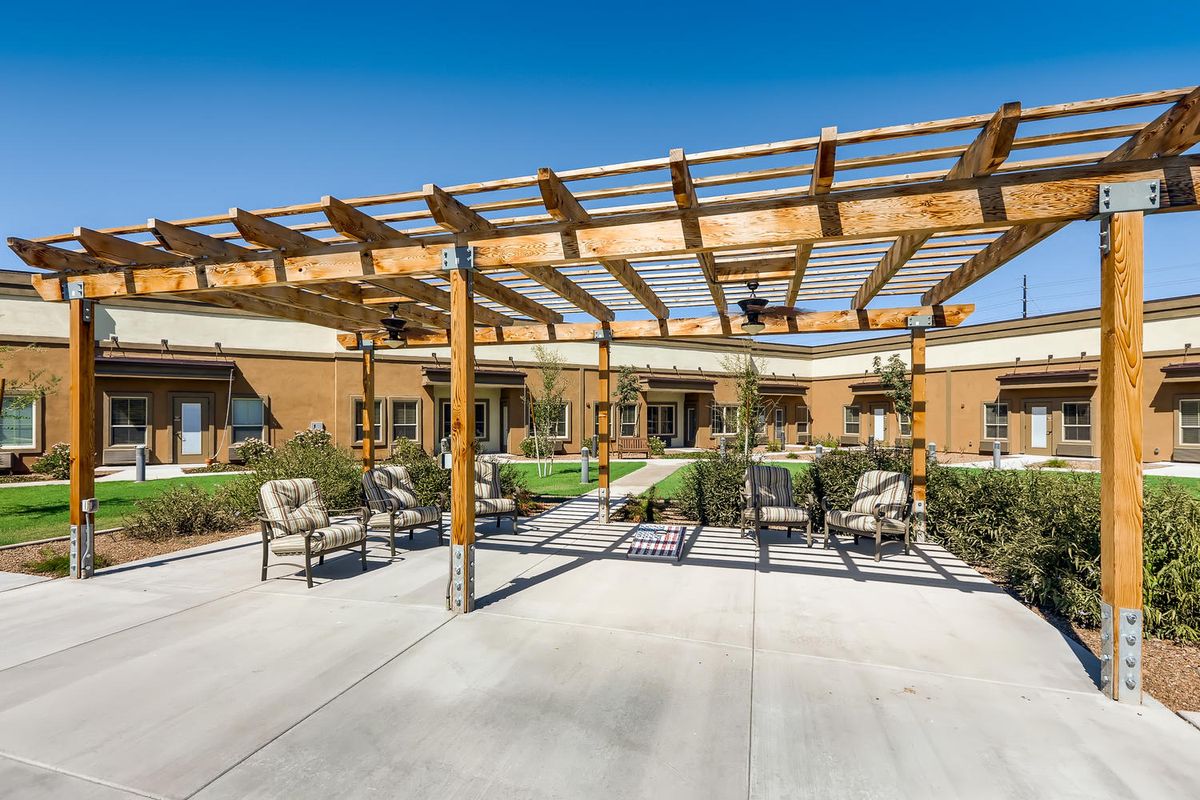 Senior living community Mariposa Point At Algodon Center featuring indoor and outdoor spaces.