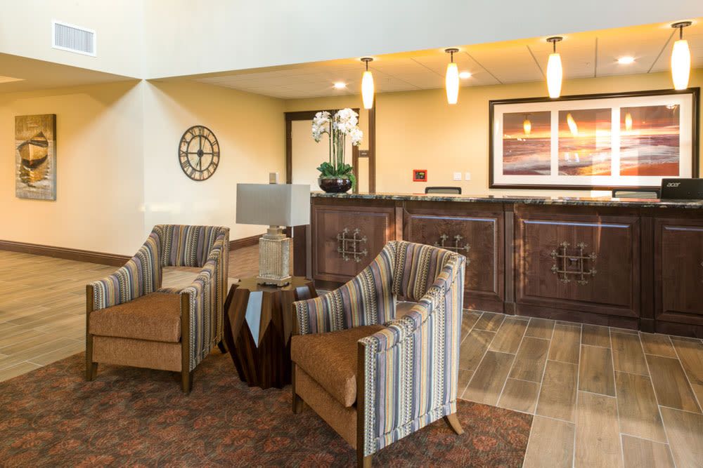 Interior view of Mariposa at Ellwood Shores senior living community featuring modern decor and electronics.