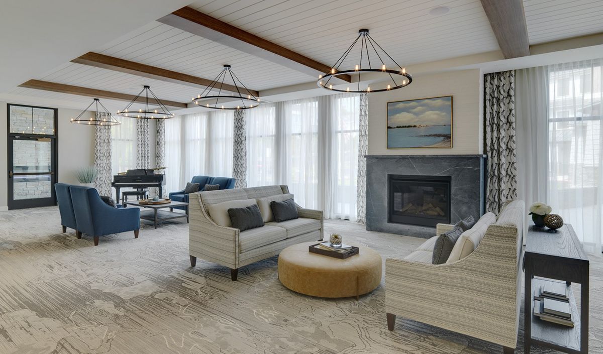 Interior view of The Residence at Westport senior living community featuring elegant home decor.