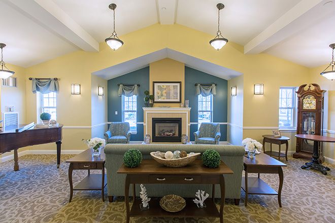 Interior view of Brookdale Cape Cod senior living community featuring elegant dining and living room decor.
