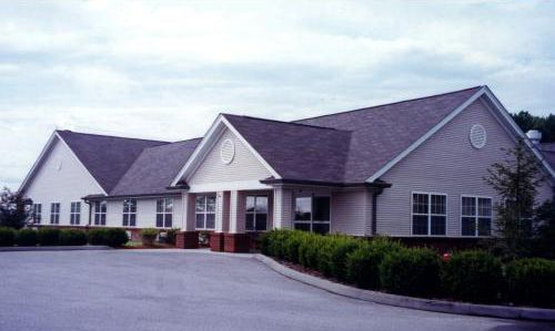 St. Andrews Assisted Living, a senior community in a suburban neighborhood with modern architecture.