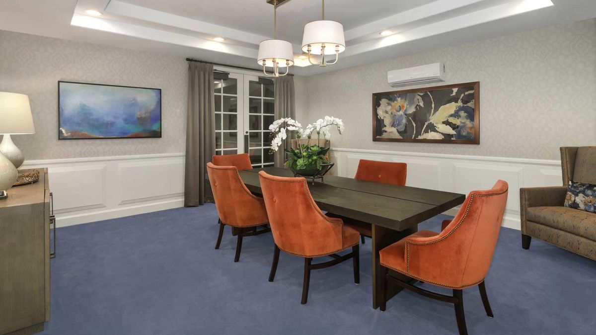 Interior view of Ivy Park at Mission Viejo senior living community featuring dining room decor.