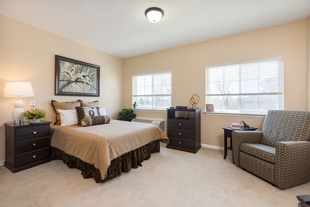 Senior living room at Cedar Lake Assisted Living, featuring cozy decor and furniture.