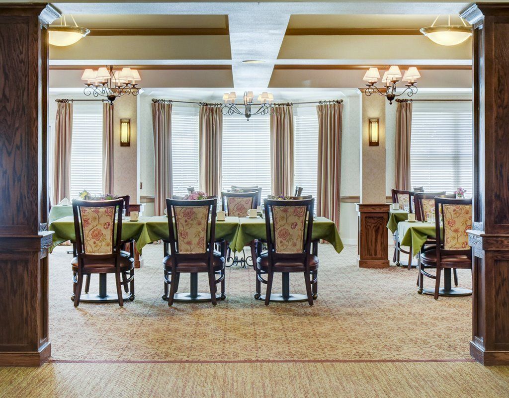 Interior view of Sunrise of Rocklin senior living community featuring dining room decor and architecture.