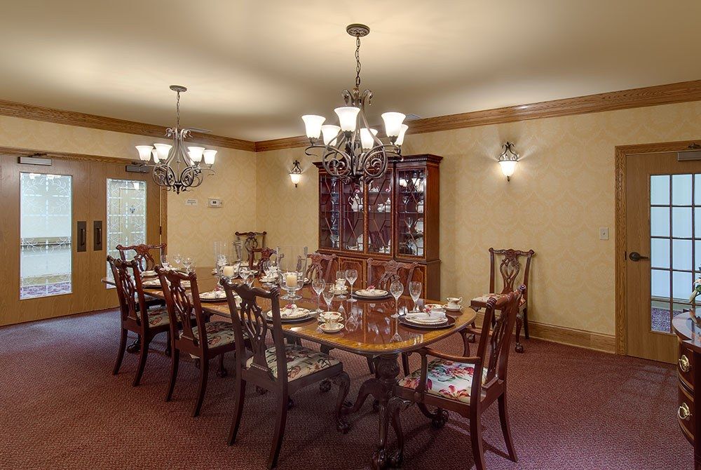 Architectural view of Barrington of West Chester senior living community with elegant dining room decor.