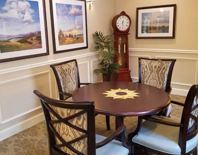 Interior view of Revere Court of South Barrington senior living community featuring dining room furniture and decor.