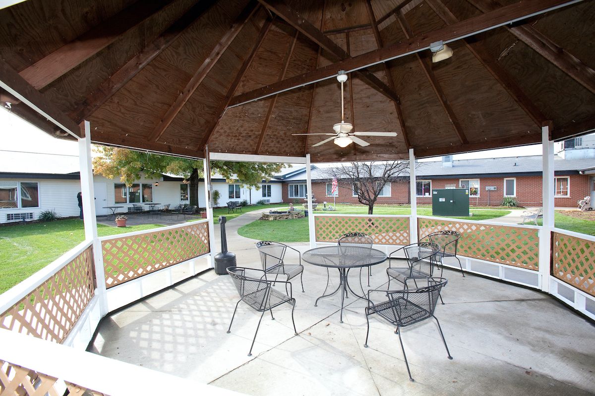 Senior living community at Fair Oaks Rehabilitation & Health Care Center with outdoor patio.