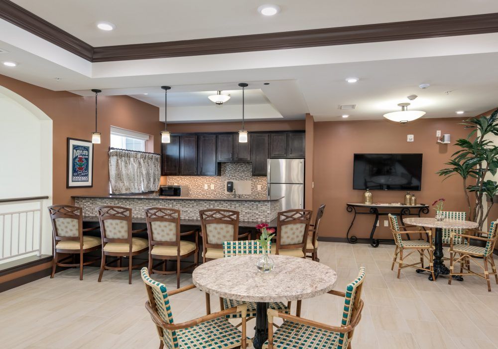 Senior living community interior at The Landing of Silver Spring featuring dining and living room.