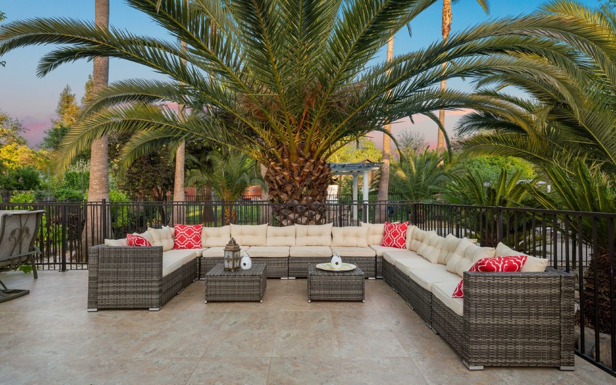 Senior living community Hollister Care Home featuring outdoor patio, garden scenery, and indoor decor.