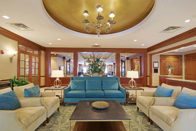 Interior view of Brookdale Creve Coeur senior living community featuring elegant decor and furniture.