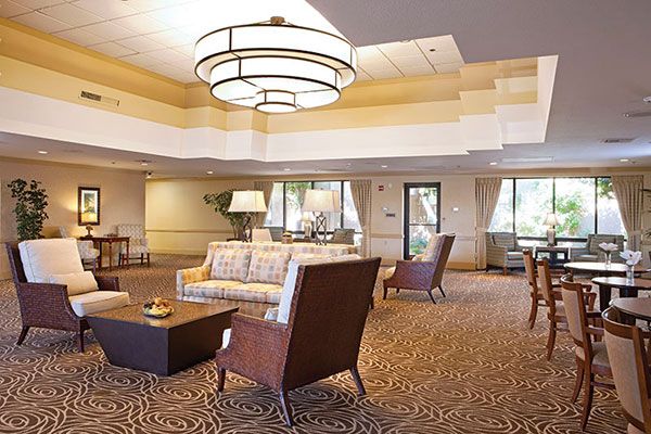 Interior view of Carlotta Ivy Signature Living community featuring elegant dining and reception areas.