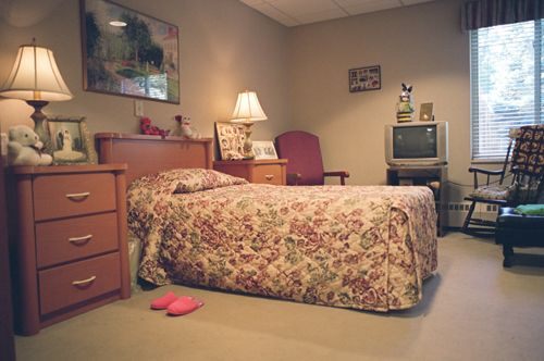 Interior view of Manoogian Manor senior living community featuring modern electronics and cozy furniture.