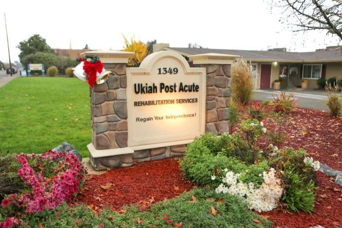 Ukiah Post Acute Rehabilitation and Skilled Nursing facility surrounded by lush greenery and park.