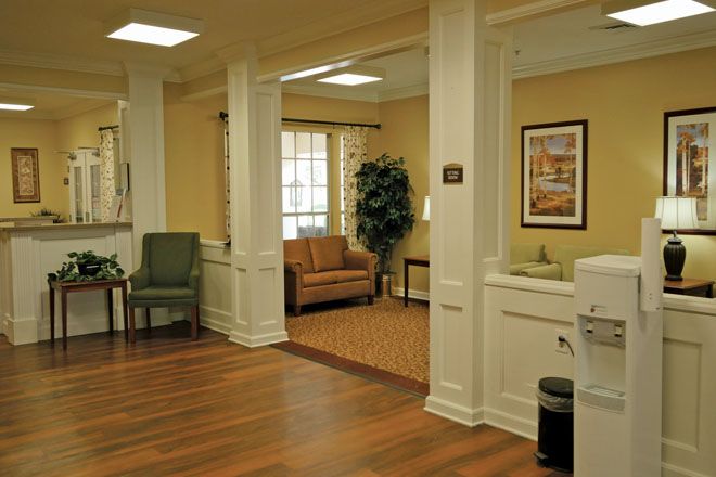 Interior view of Brookdale Central Chandler senior living community featuring hardwood floors and modern decor.