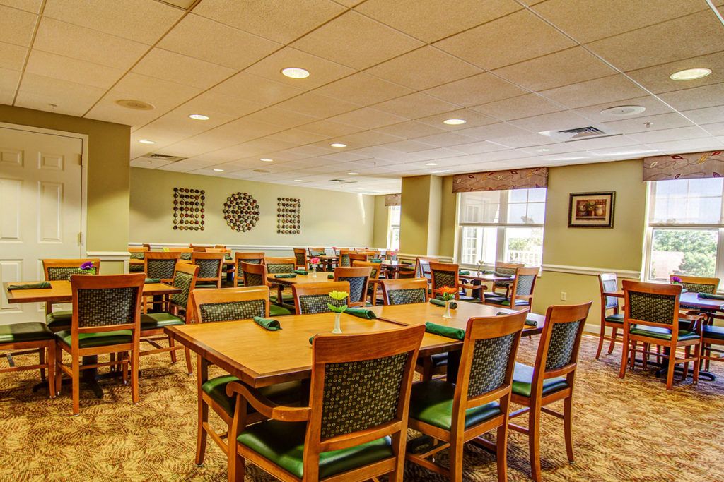 Interior view of the Cafeteria at Meramec Bluffs Senior Living Community with modern furniture.