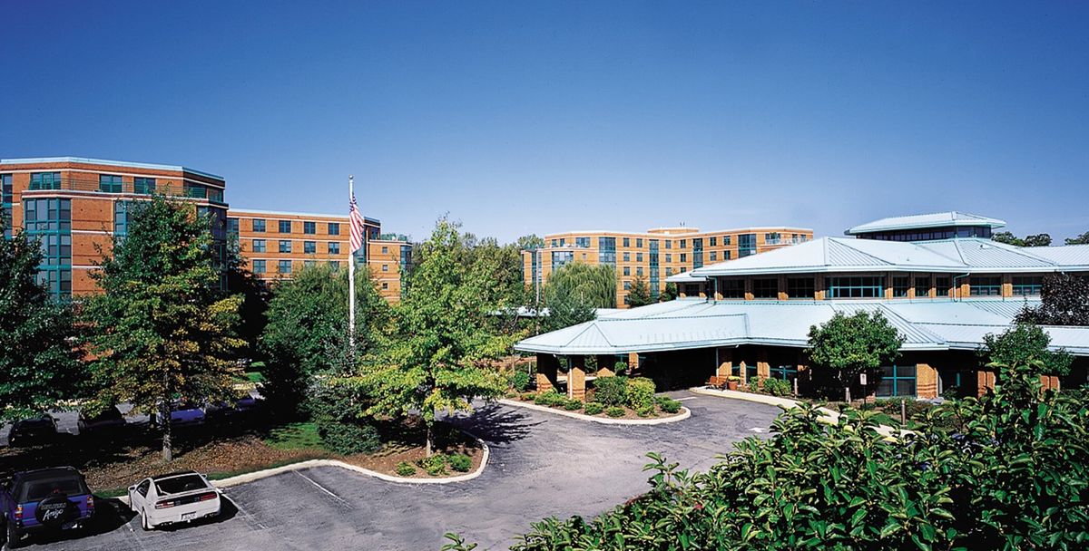 Senior living community, Ascension Living Bethlehem Woods, featuring urban architecture and lush greenery.