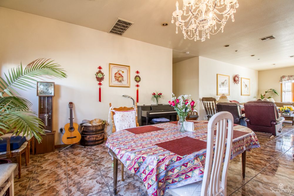 Interior view of E & E Sunshine Manor 2, showcasing elegant dining and living areas with tasteful decor.