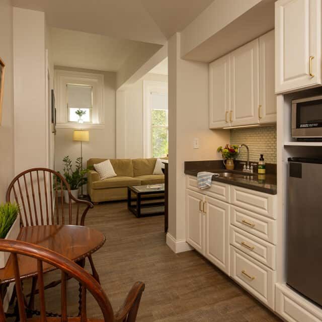 Interior view of The Cambridge Homes senior living community featuring modern decor and appliances.