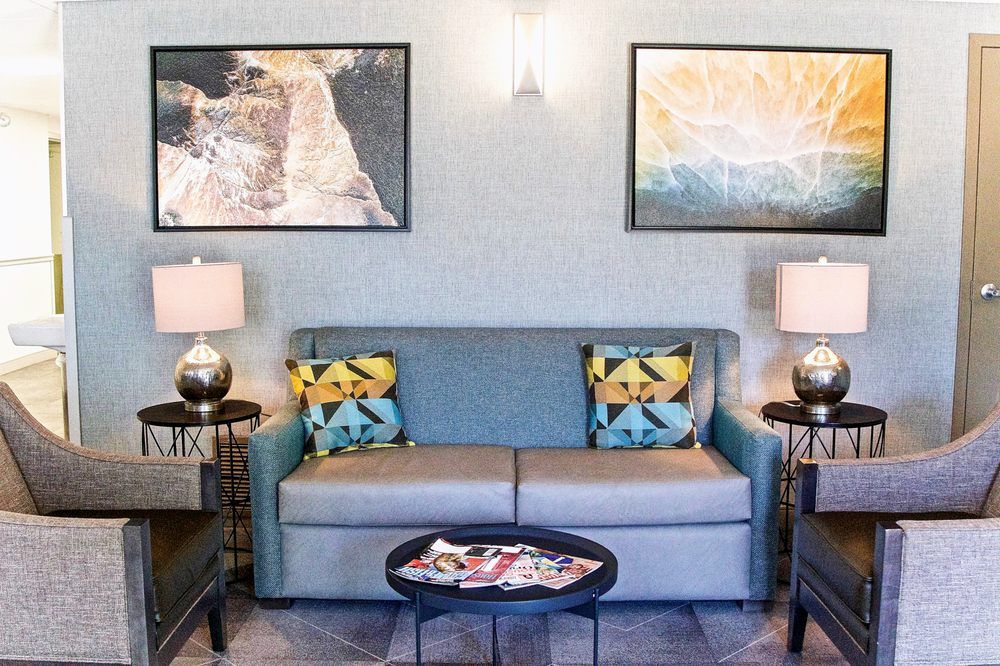 Interior view of Jackson Park Supportive Living Facility featuring elegant furniture and art.