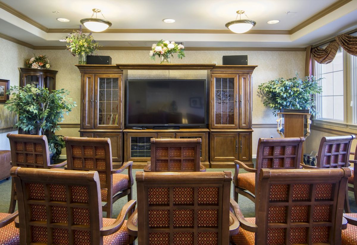 Interior view of Ivy Park at Playa Vista senior living room with modern design and electronics.
