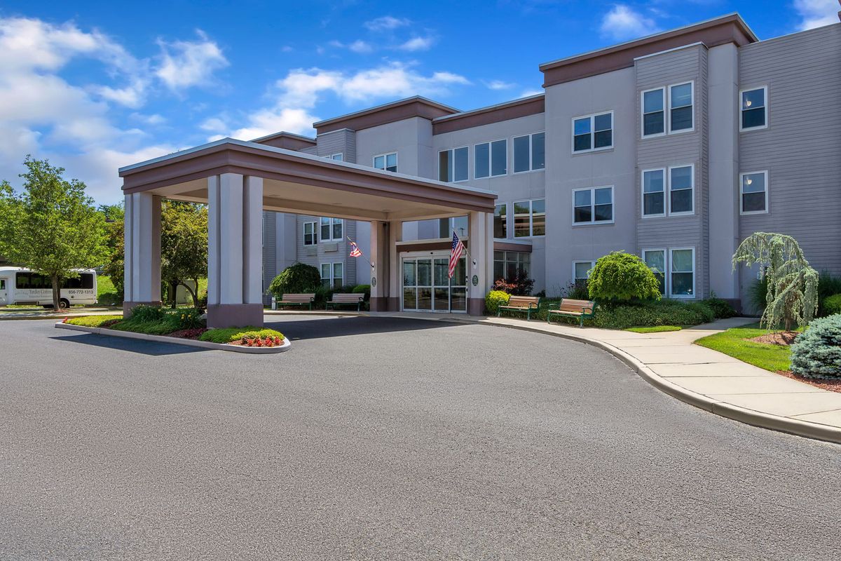 Senior living community Seaton Voorhees with city architecture, housing, and transportation.