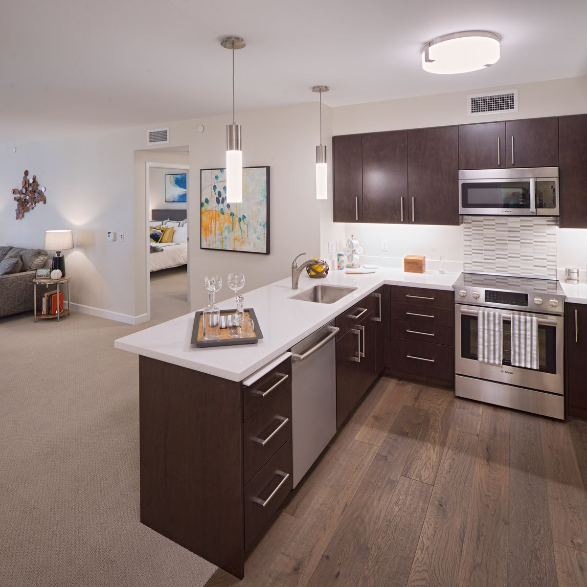Interior view of Viamonte At Walnut Creek senior living community featuring a modern kitchen and furniture.