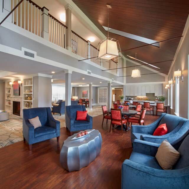 Senior living community living room in Forestdale Park featuring cozy furniture and home decor.