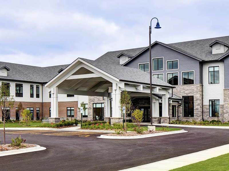 Senior living community, Atria At River Trail, featuring modern architecture and housing.