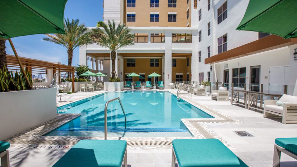 Belmont Village Senior Living in Fort Lauderdale, a waterfront resort-style senior housing with pool.