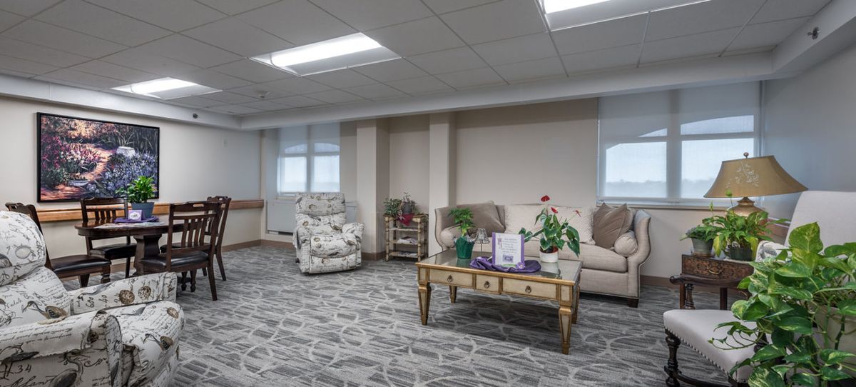 Interior view of Chateau de Notre Dame Assisted Living with elegant furniture and decor.