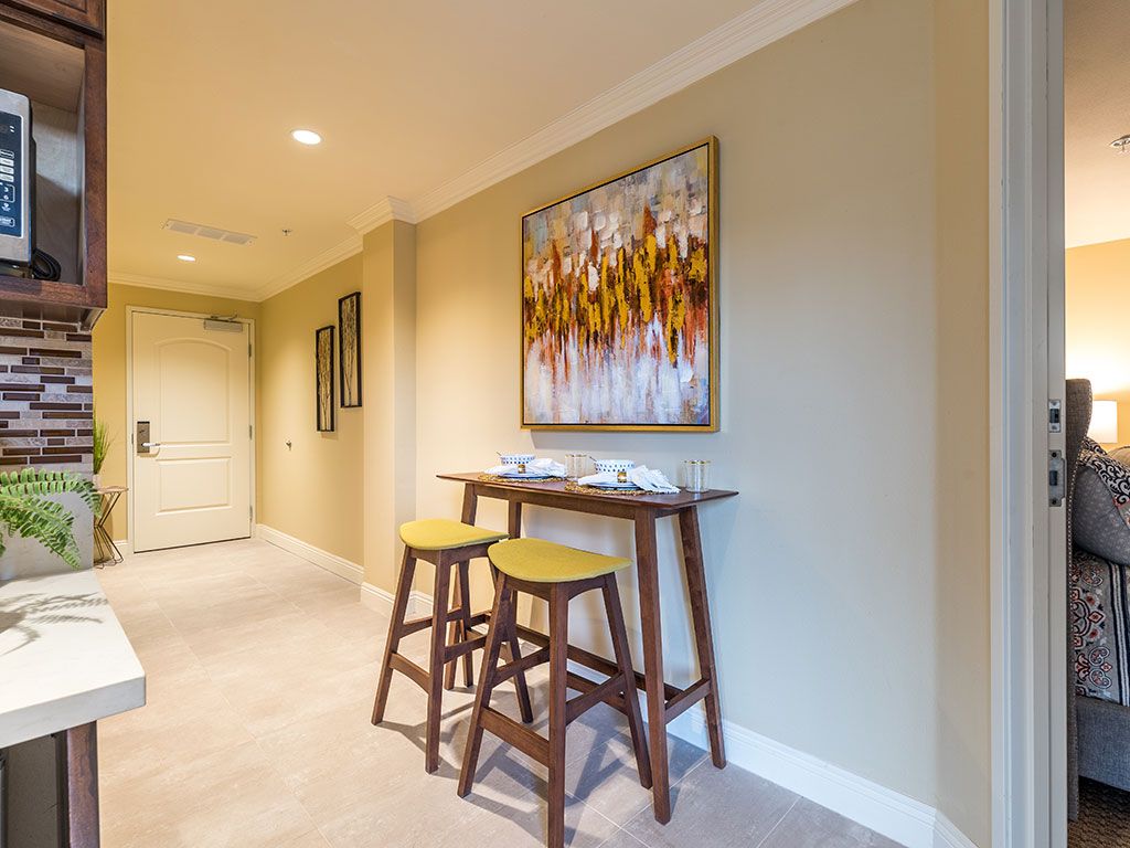 Interior view of Hollywood Hills, a Pacifica Senior Living Community, showcasing elegant decor and furniture.