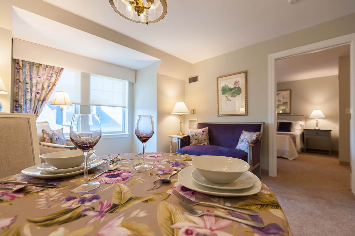 Senior living community Providence House featuring elegant dining room architecture and decor.
