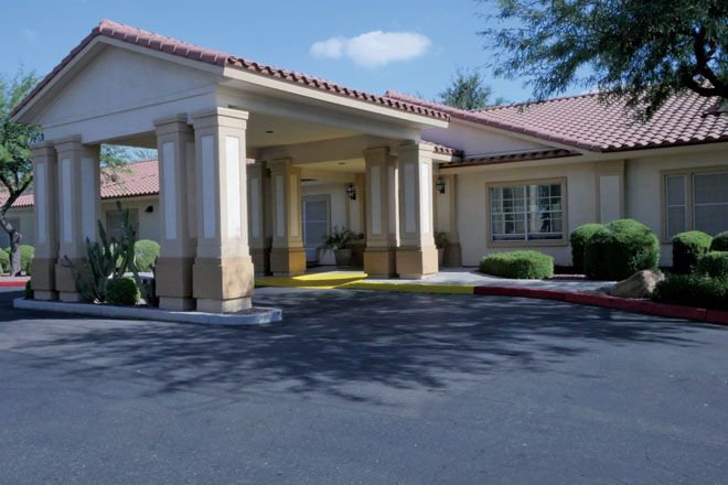 Brookdale Central Chandler senior living community featuring villa-style housing and portico architecture.