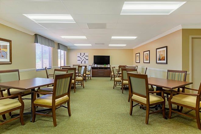 Interior view of Brookdale Phillippi Creek senior living community featuring dining area and art.