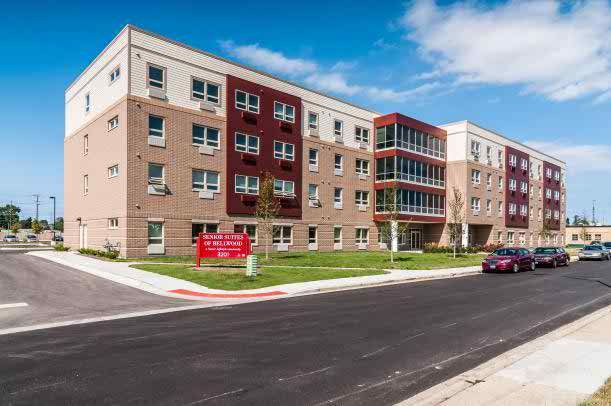High-rise senior living community, Senior Suites of Bellwood, in urban neighborhood.