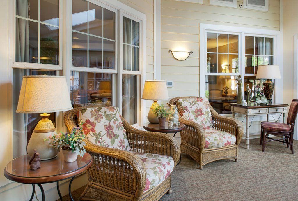 Senior enjoying a cozy living room with modern decor at Sunrise Assisted Living of Leawood.