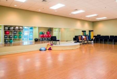 Indoor view of Christwood senior living community featuring flooring, hot tub, play area, and lighting.