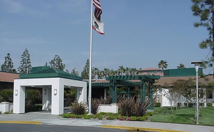 Eastern Star Senior Living Community in CA, showcasing its architectural building, outdoor shelter, and housing.